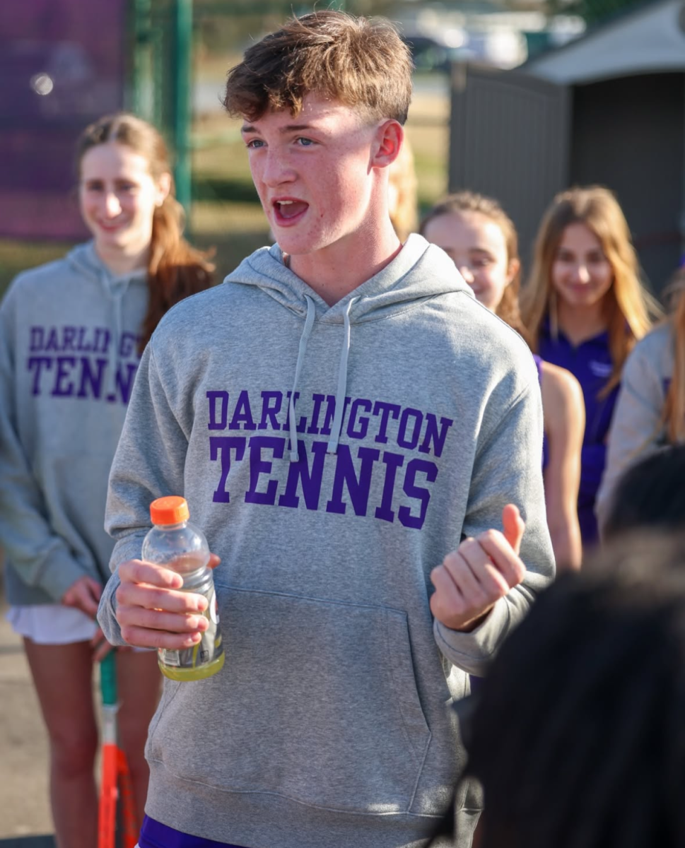 John Courtney giving a pep-talk to the team before they start their matches.